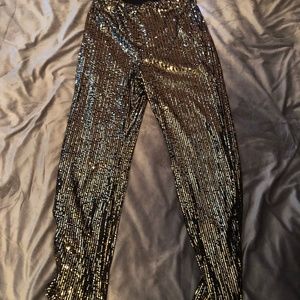 Black gold wide leg sequin pants.  Size M